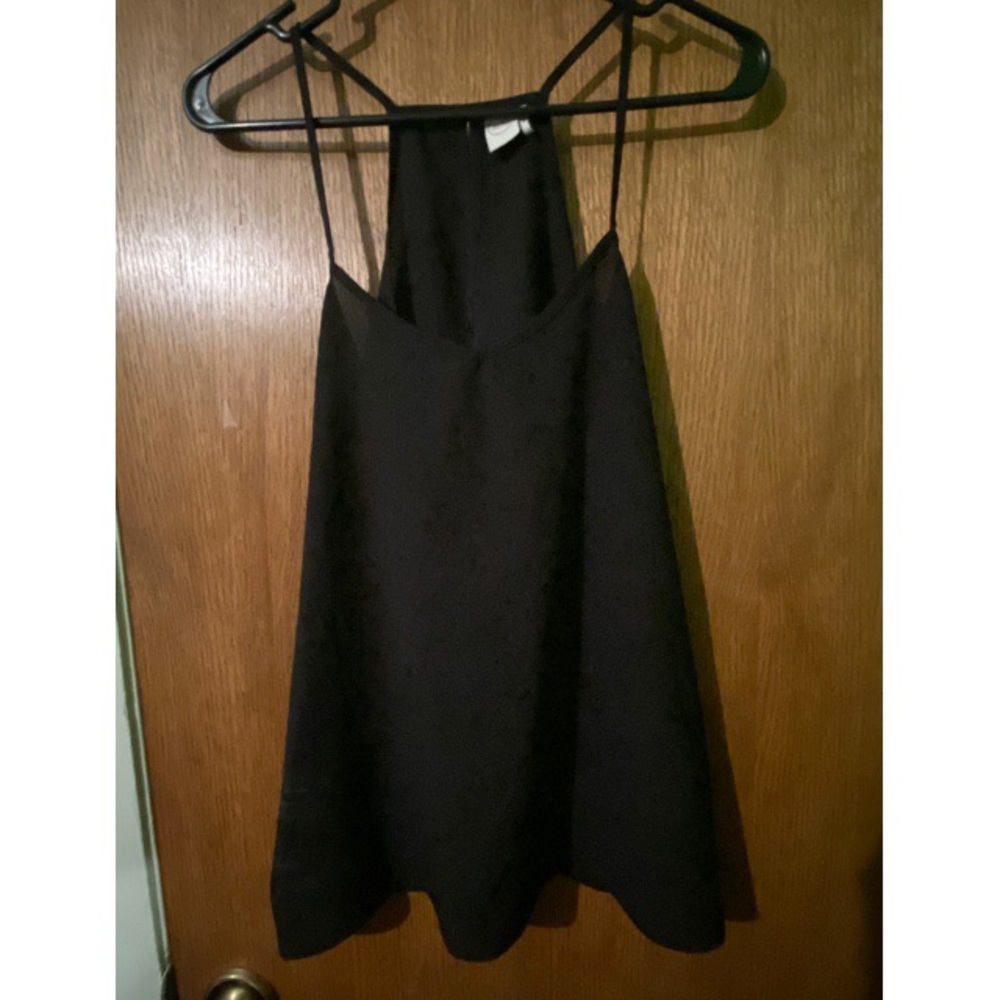 Black spaghetti strap top.